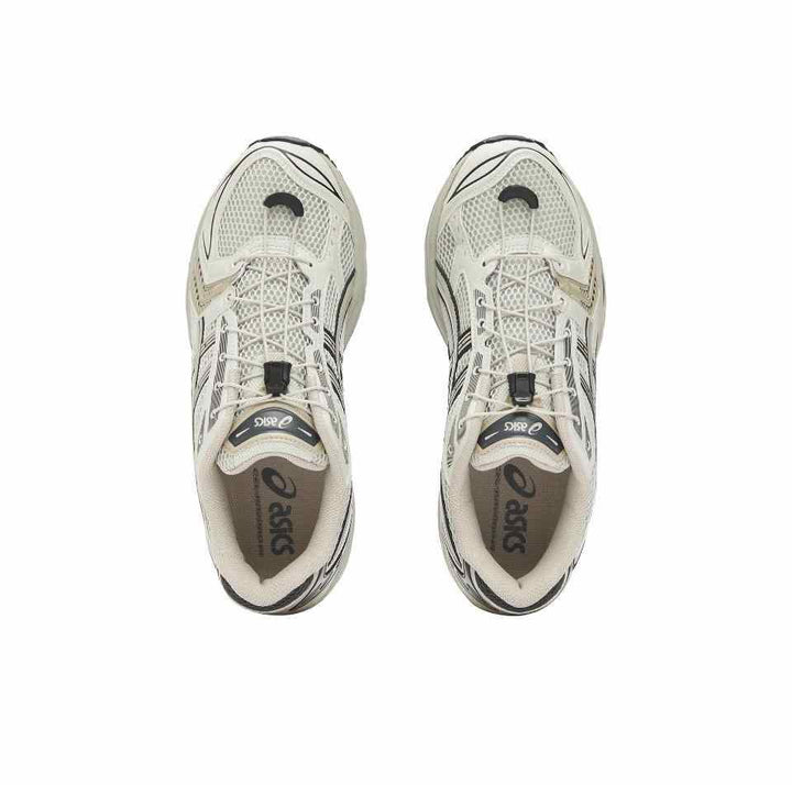 Asics حذاء سنيكرز Gel-Kayano 14 باللون الرمادي مع مقدمة لوزية ونظام إغلاق سريع.