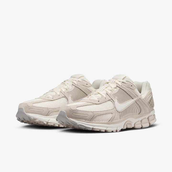 Nike Zoom Vomero 5 in ivory, showcasing a sleek design with mesh leather and Zoom Air cushioning for superior comfort and durability.