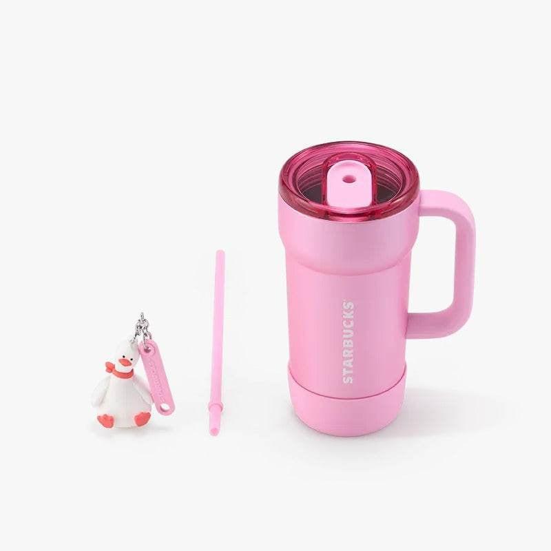 كوب Starbucks وردي مع يد وميدالية بطة لطيفة.