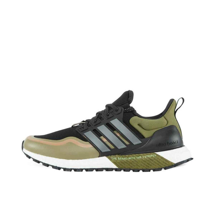 adidas Ultra Boost Trail running shoe in black, olive, and brown with Boost technology and Continental outsole.