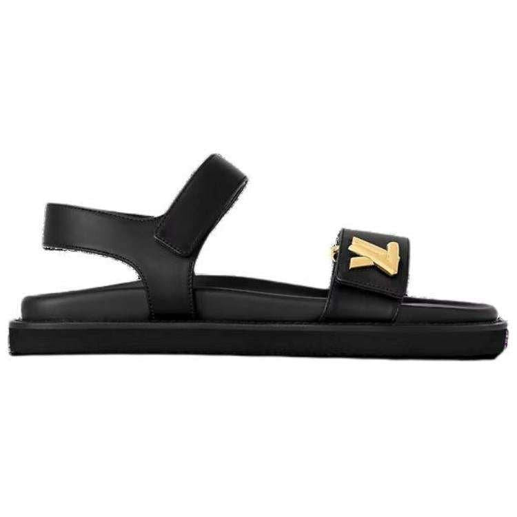Louis Vuitton صندل Flat نسائي جلد أسود مريح بشعار ذهبي.
