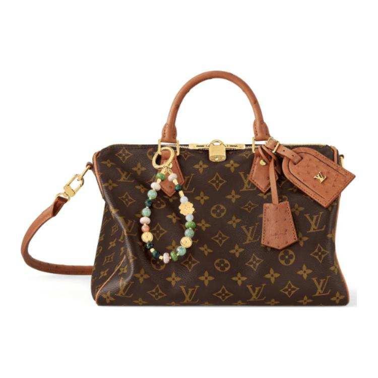 حقيبة Louis Vuitton Monogram بجلد Ostrich بني وأنيق.