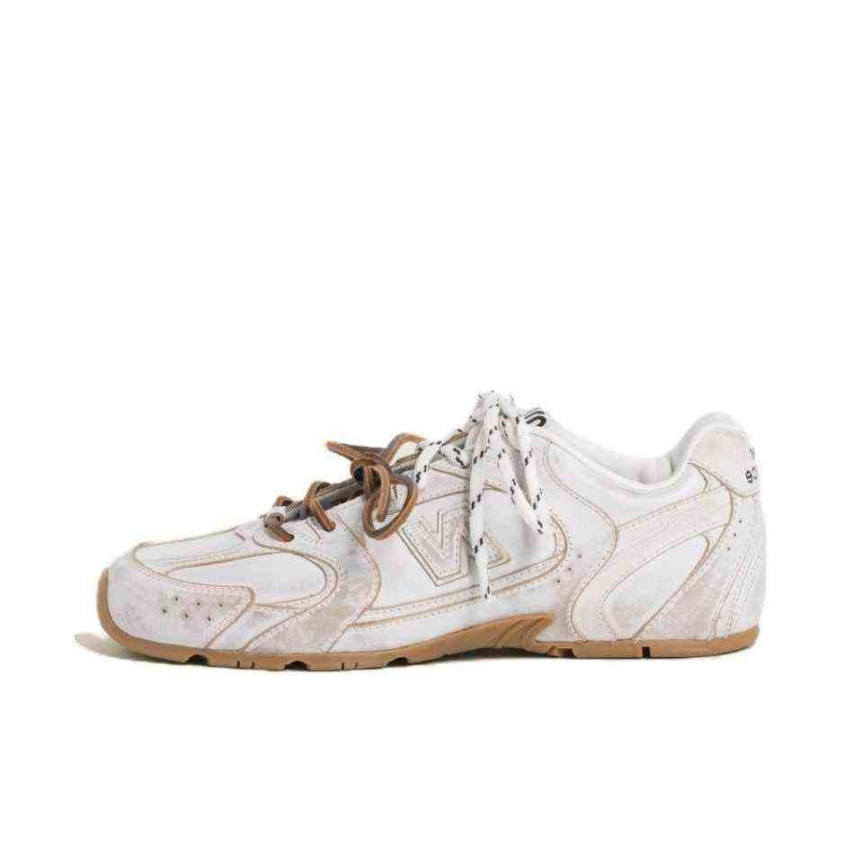 سنيكرز 530 أسفل الكاحل جلد نيو بالانس × ميو ميو New Balance X Miu Miu.