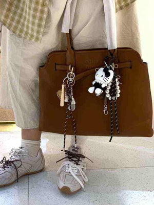 سنيكرز 530 أسفل الكاحل جلد نيو بالانس × ميو ميو New Balance X Miu Miu.