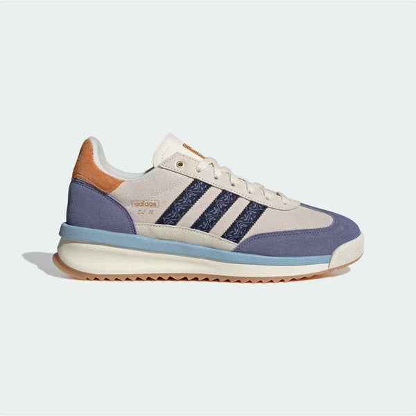 Adidas Clover casual sneakers in blue and beige with modern design.