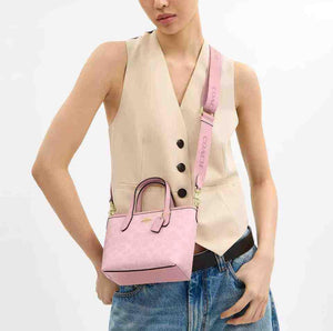 coach city 15 حقيبة كوتش صغيرة وردي ناعم.