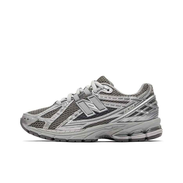 New Balance 1906R metallic silver running shoe with breathable mesh and cushioned sole