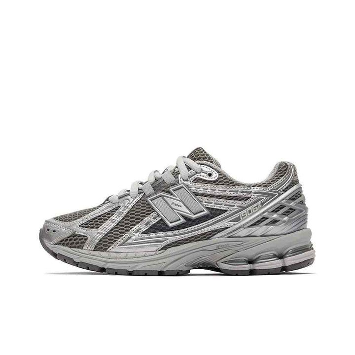 New Balance 1906R metallic silver running shoe with breathable mesh and cushioned sole