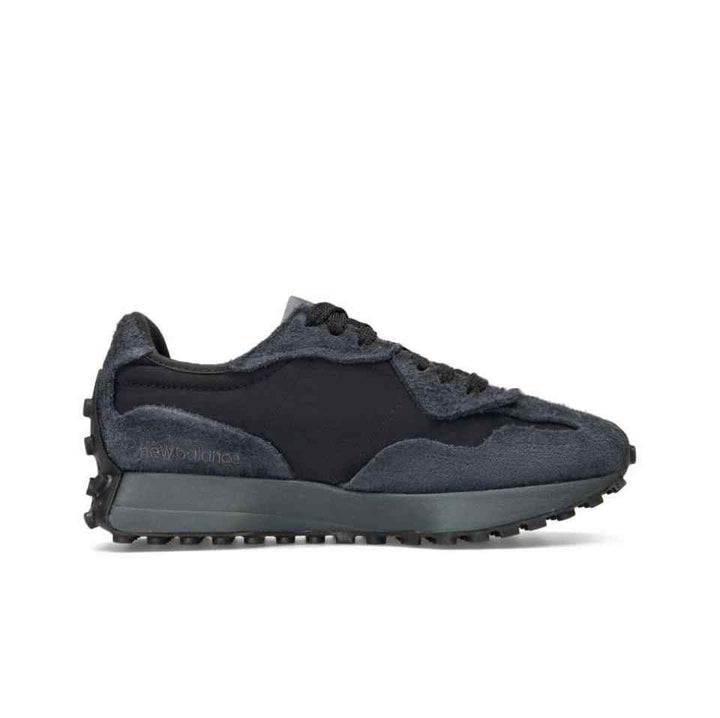 New Balance 327 sneaker in black fabric and suede with bold "N" logo and rubber outsole.