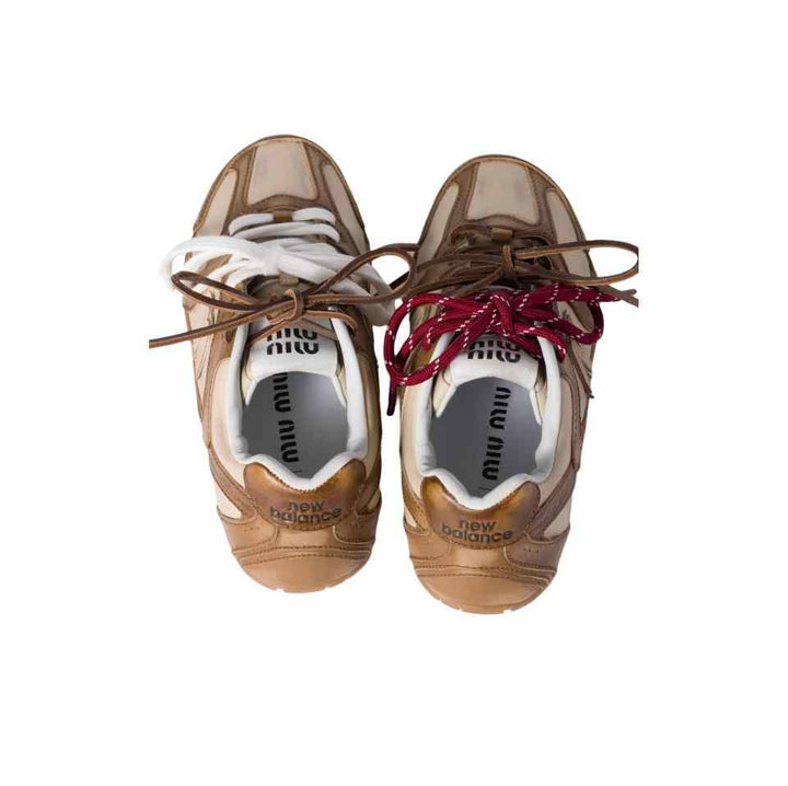 New Balance X Miu Miu 530 SL sneakers in calf leather with dual-tone design and cotton-leather laces.