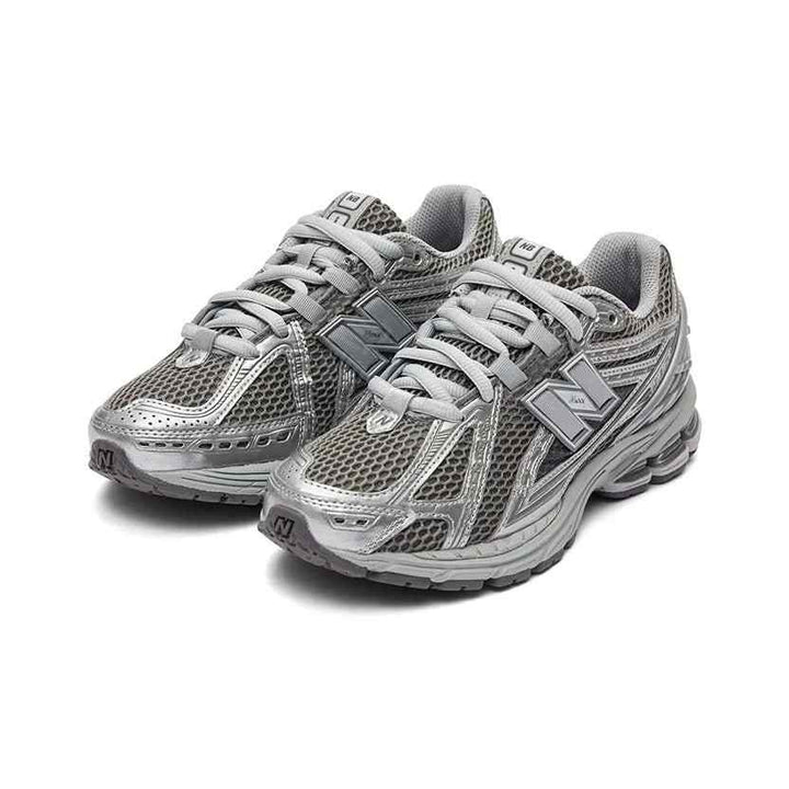 New Balance 1906R metallic silver breathable mesh running shoes with N-ergy and ABZORB cushioning for all-day comfort