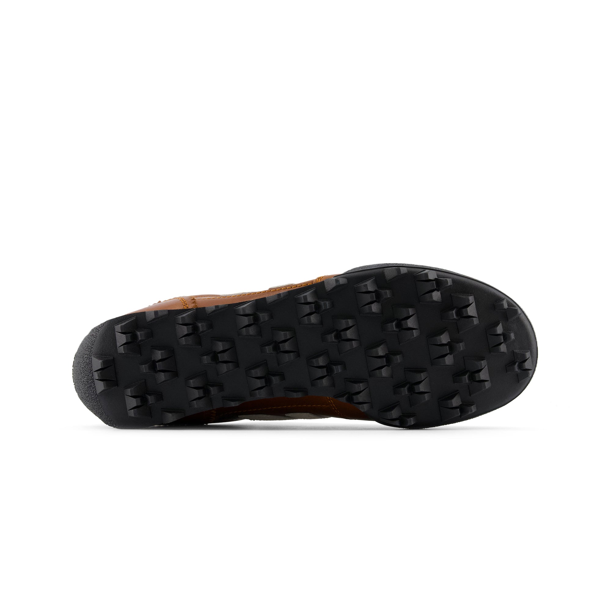 Bottom view of the sole and tread pattern on Donald Glover x New Balance RC30 cognac brown shoes.