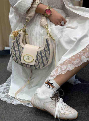 سنيكرز 530 أسفل الكاحل جلد نيو بالانس × ميو ميو New Balance X Miu Miu.