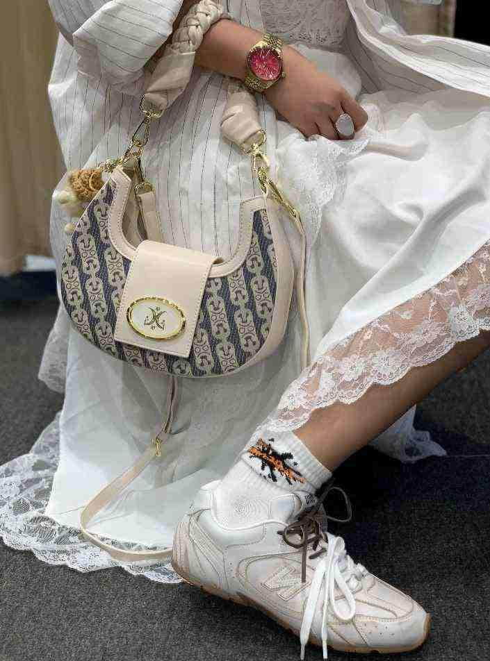 سنيكرز 530 أسفل الكاحل جلد نيو بالانس × ميو ميو New Balance X Miu Miu.