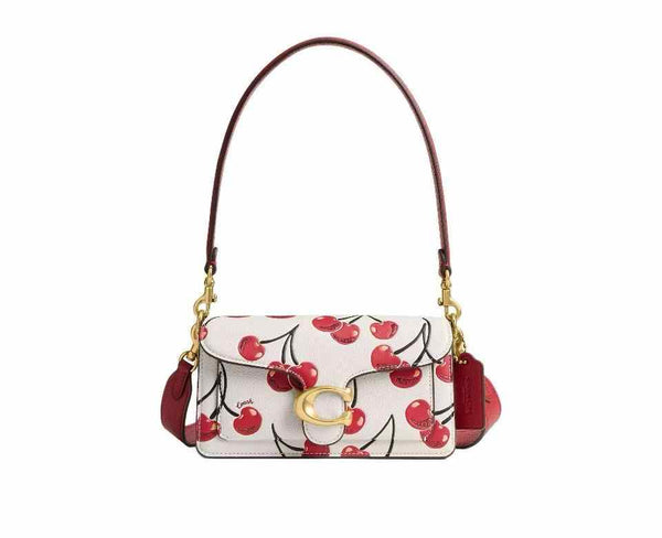 Structured Tabby Shoulder Bag 20 with cherry print, detachable straps, gold accents.