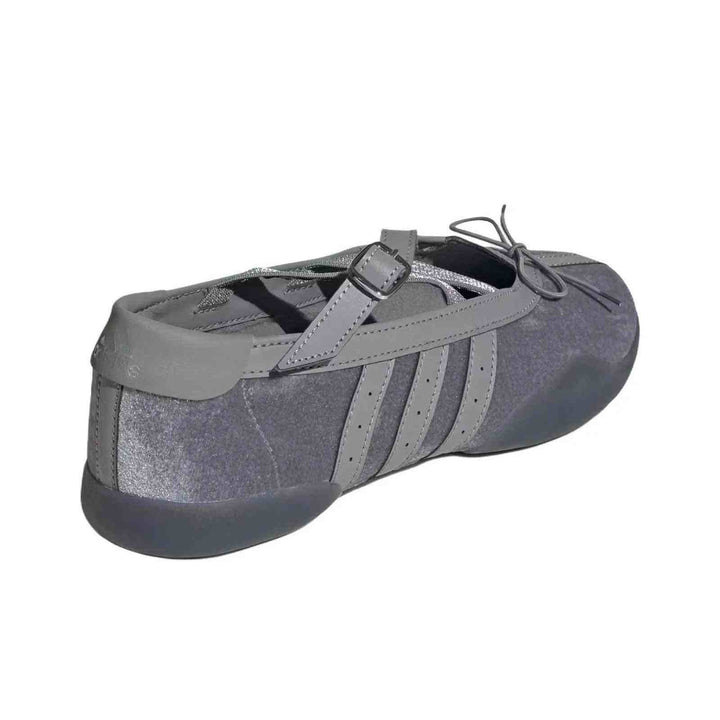 Grey Adidas Ballet Flats with shiny upper, leather details, crossed buckle strap, and flexible sole