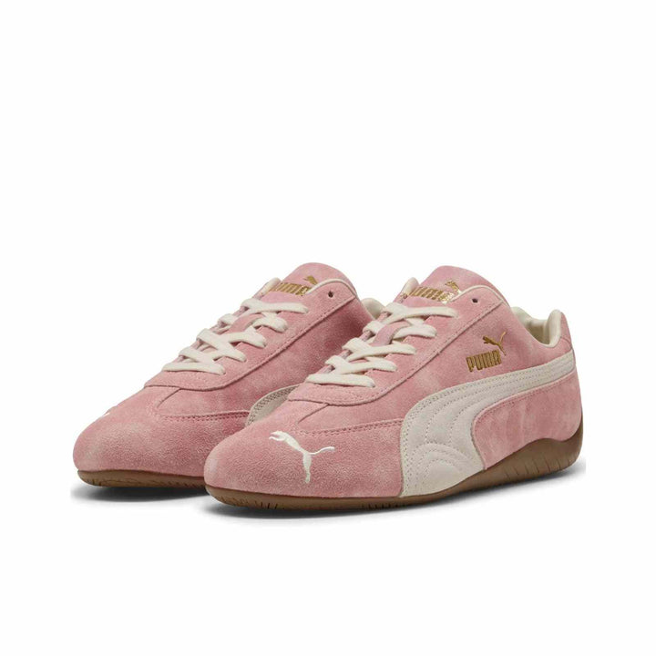 Pair of PUMA Palermo OG vintage sneakers in pink suede with ivory accents and gold Puma logos