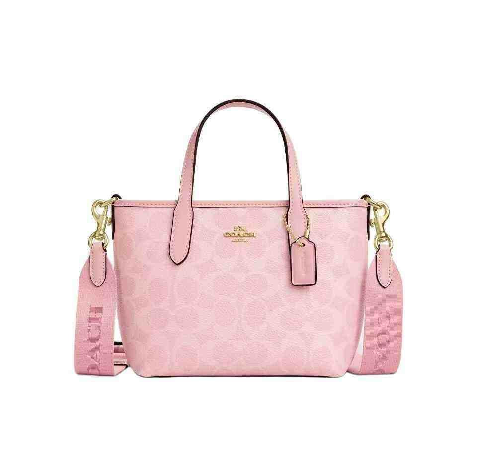 coach city 15 حقيبة كوتش صغيرة وردي ناعم.