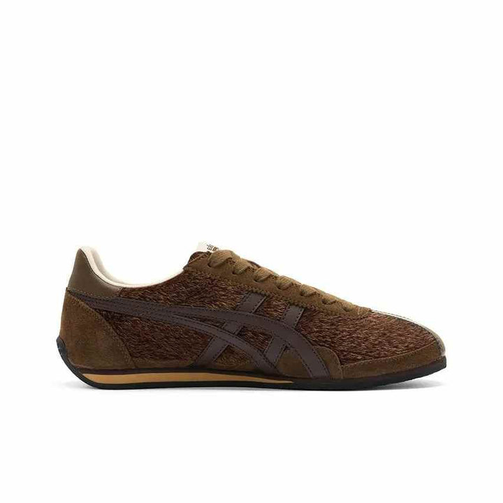 Brown Asics Onitsuka Tiger Mexico 66 sneaker with luxurious leather and iconic side stripes.