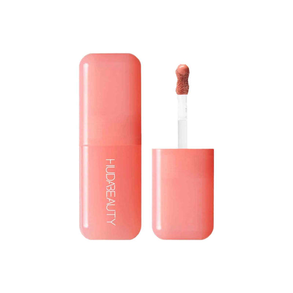 Huda Beauty Baby Blush Peach Sorbet compact blush with applicator in coral pink packaging