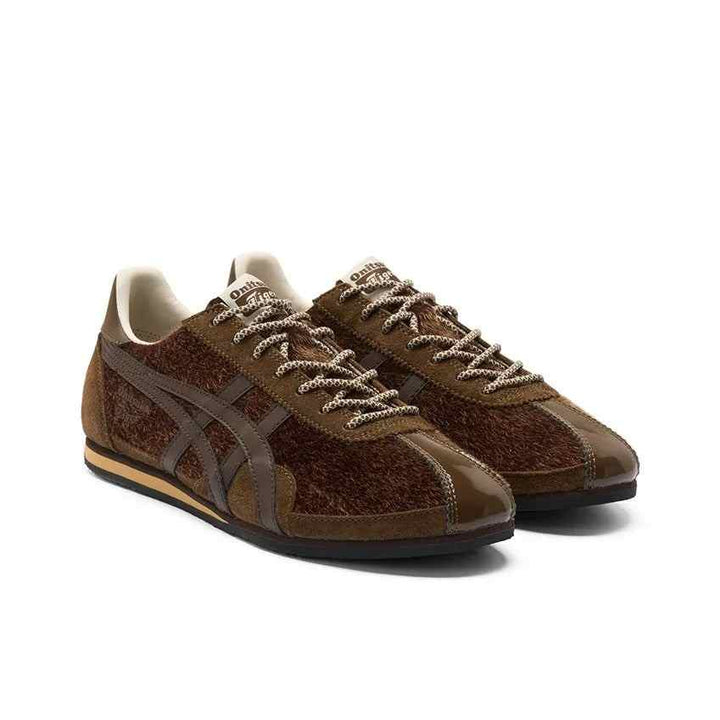 Brown luxury Asics Onitsuka Tiger Mexico 66 sneakers with iconic side stripes and cushioned sole for comfort and style