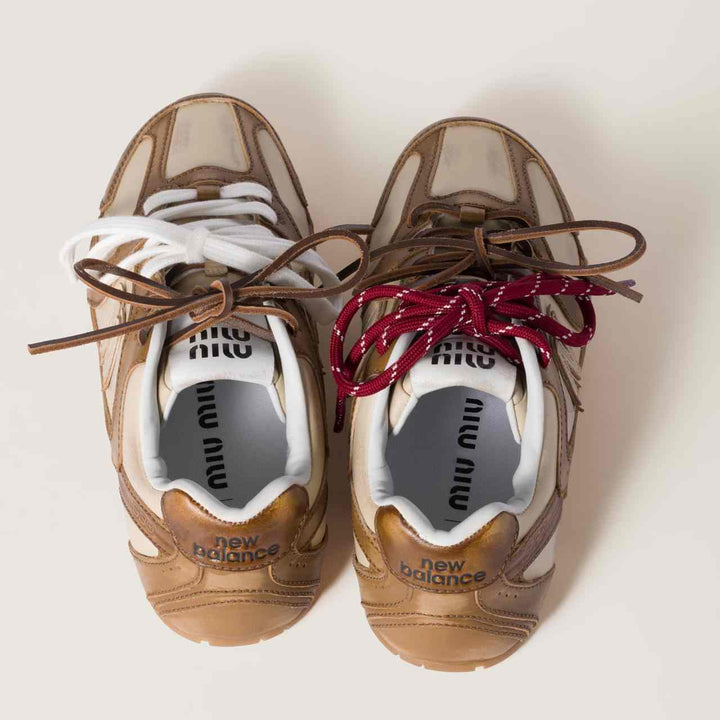 New Balance X Miu Miu 530 SL calf leather sneakers with two-tone laces.