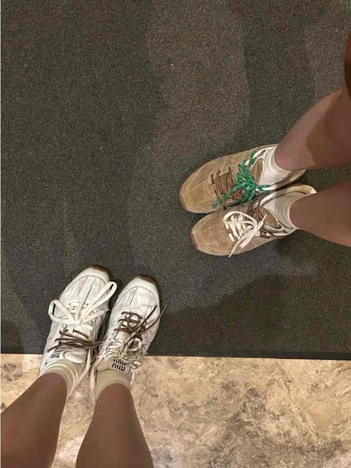 New Balance x Miu Miu suede sneakers with unique double laces.