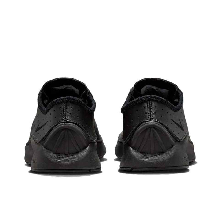 Black Nike Air Superfly sneakers with perforated details, matching black closure and laces, cushioned sole, and brand logo on the heel.
