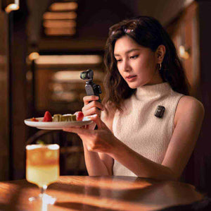 كاميرا DJI Osmo Pocket 3 بدقة 4K وشاشة دوارة.