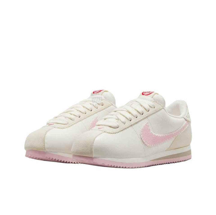 Nike Cortez women's classic lightweight walking shoes in white with pink accents