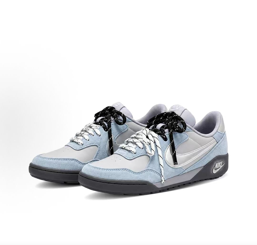 The angled perspective highlights Nike Shoes craftsmanship, showcasing the حذاء نايك الأصلي مع حذاء نايكي ستريتغاتو أزرق وفضي | Nike Streetgato Blue Silver ضمن أفضل موديلات شوز نايك وتصاميم nike schuhe.