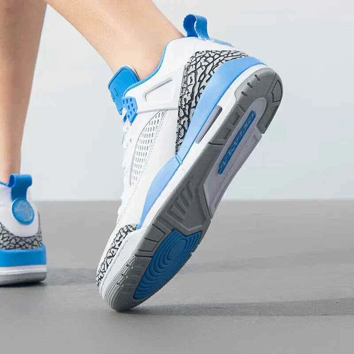 Nike men's JORDAN SPIZIKE LOW sneaker in white, anthracite, wolf grey, and cool grey, showcasing rear and sole design.