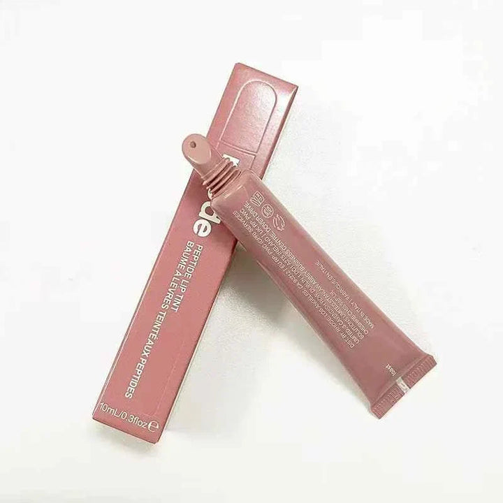 Rhode Peptide Lip Tint لون خوخي ومرطب للشفاه في أنبوب وردي