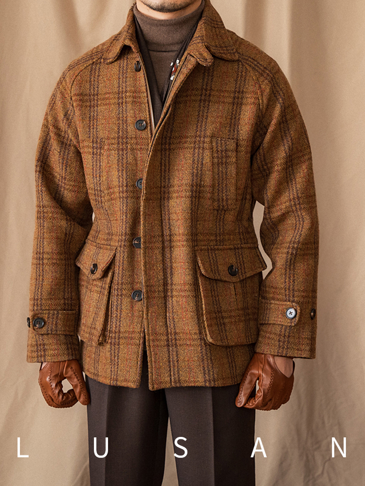 Mr. Lusan hunting tweed jacket in brown-orange plaid wool for warmth and wind resistance with adjustable cuffs and multiple pockets