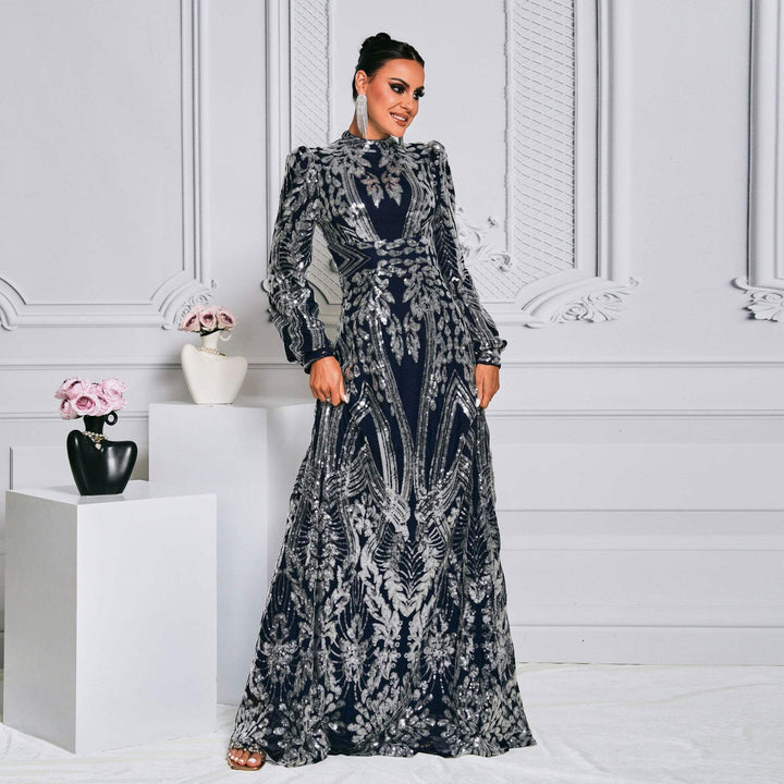 Elegant long sequined evening dress with puffed sleeves and defined waist, perfect for formal occasions.