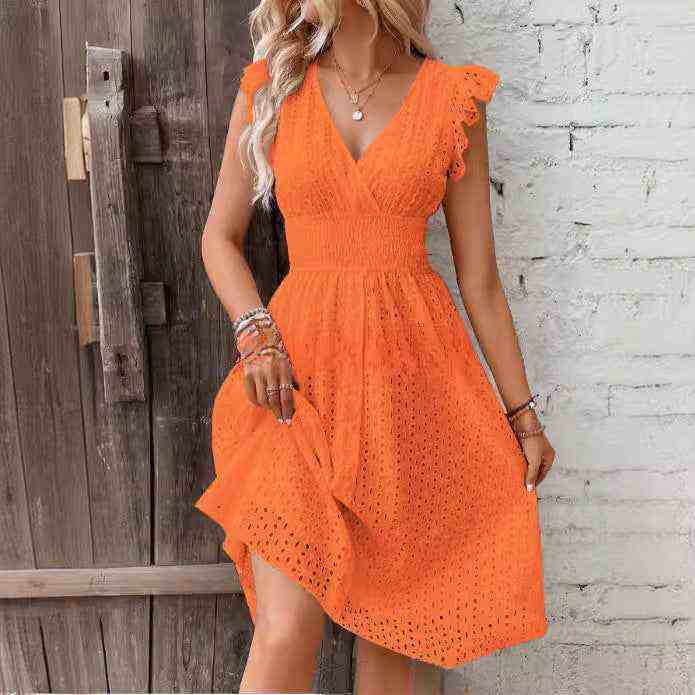 Elegant orange V-neck dress with ruffle sleeves, perfect for plus-size women's fashion.