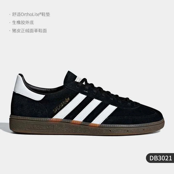 Black and white Adidas Spezial Clover low-top sneakers with gum sole and signature three stripes design