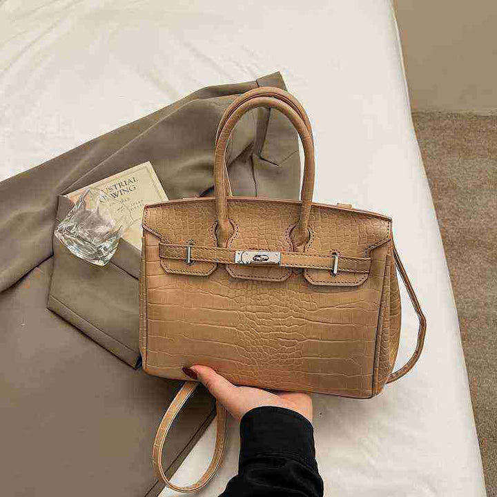 Women's Birkin-style handbag with crocodile pattern in tan color, high-quality leather texture, practical crossbody design.