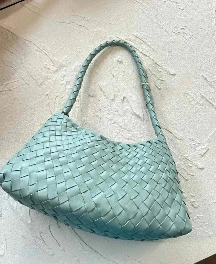 Light blue dragon woven bag made from premium natural cow leather with handwoven design and comfortable strap.