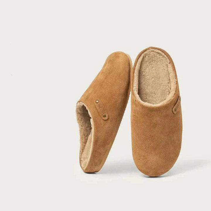 نعال منزلي جلد سويدي مبطن بالقطن بداخل دافئ ومقاوم للانزلاق تصميم أنيق ومرن