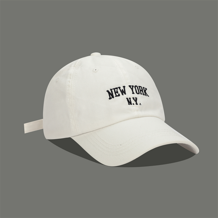 قبعة بيسبول ناعمة مطرزة من ماركة كوريا تايد باللون الأبيض بشعار نيويورك