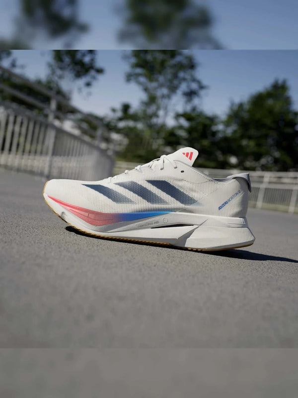 حذاء ADIZERO BOSTON 12 للجري بتصميم شبكي كريمي ونعل خارجي للعزل من أديداس للرجال والنساء