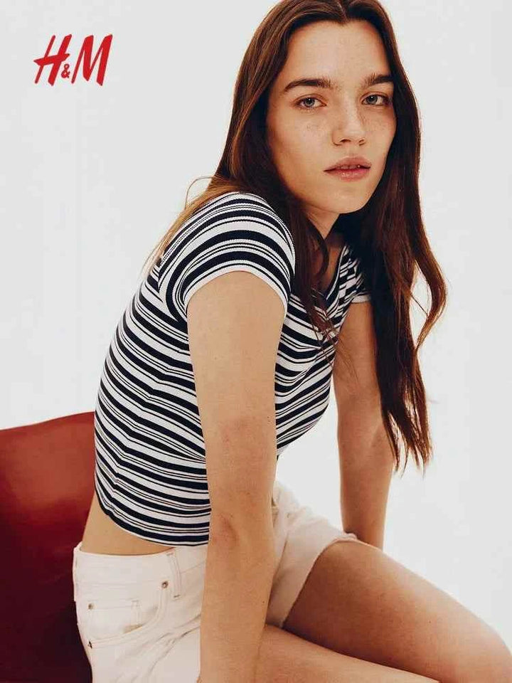 Striped ribbed H&M boat neck t-shirt with short sleeves.اتش اند ام