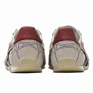 حذاء رياضي Onitsuka Tiger PandaPrank بتصميم عصري أبيض وأسود.