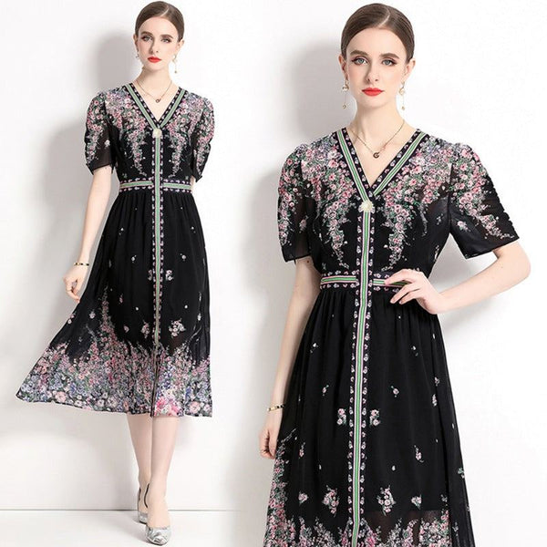 Elegant black chiffon dress with floral prints, puff sleeves, V-neck, and decorative details, perfect for summer 2024 events.