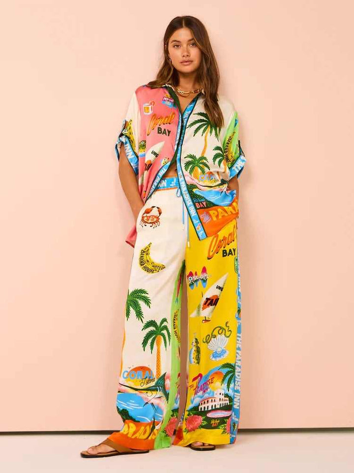 Fashionable woman in European and American print color-blocked resort casual tether set.