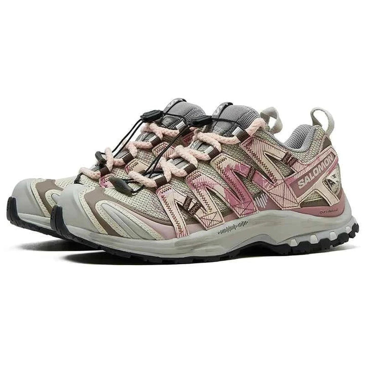 Salomon XA Pro 3D limited edition hiking shoes with pink and beige tones, Contagrip sole, and Quicklace system for outdoor adventures.