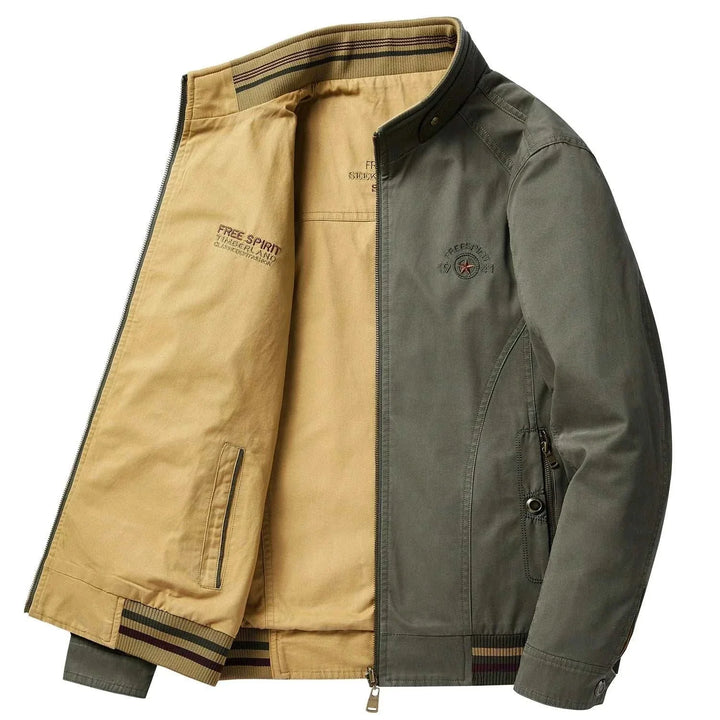 جاكيت رجالي عاكس بوجه خارجي كحلي ووجه داخلي بيج بقماش قطني مقاوم للتجاعيد وأزرار ضغط وجيوب بسحاب