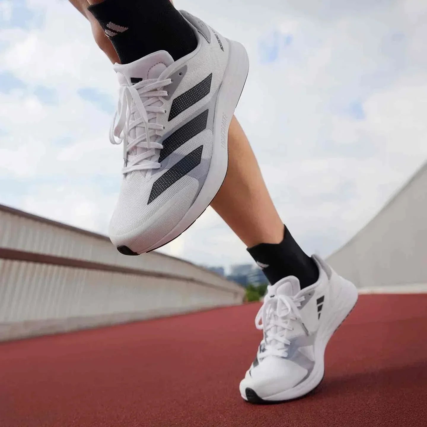 Adidas | أديداس حذاء Adizero RC 4 للجري والتدريب.