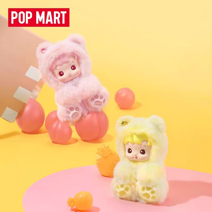 دمى سلسلة Hacipupu Gummy Bear من Pop Mart بتصاميم دمى فينيل محشوة بألوان وردي وأصفر مع شكل دب صغير جذاب ونكهات فواكه متنوعة.
